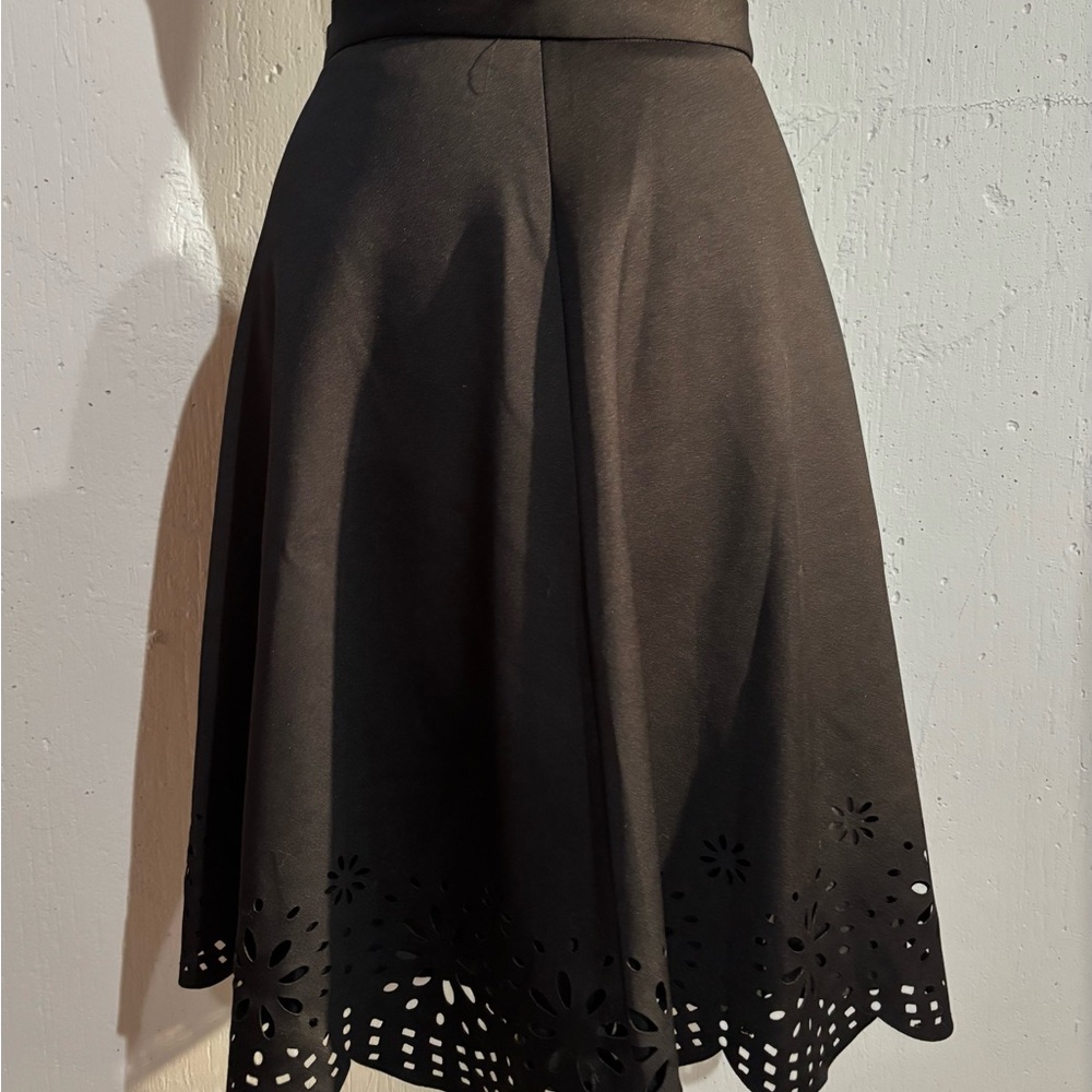 Black Knee-Length A-Line Skirt with Cut Out Details